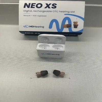 The MDHearing NEO XS unpackaged on a table