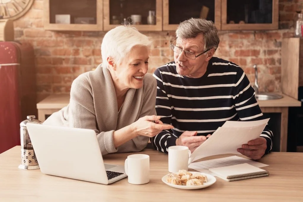 senior couple planning family budget