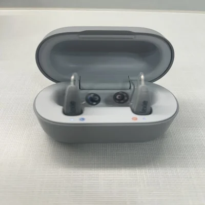 Lexie B2 Plus hearing aids in its case