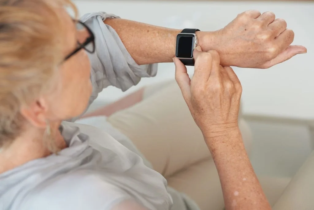 checking smartwatch