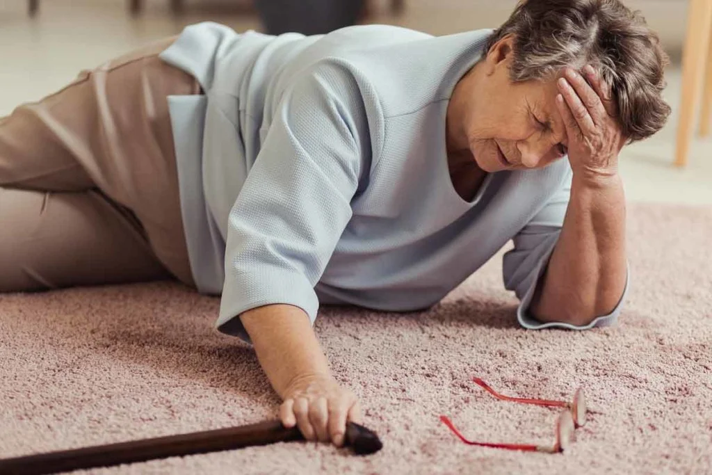 women who has fallen on the floor