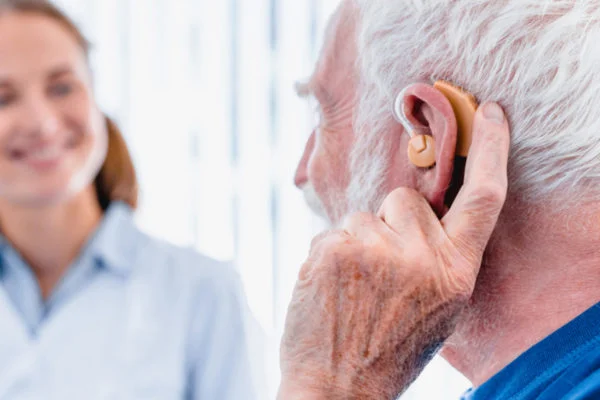 Elderly wearing hearing aids