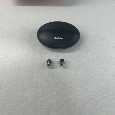 The Eargo 7 hearing aids and charging case